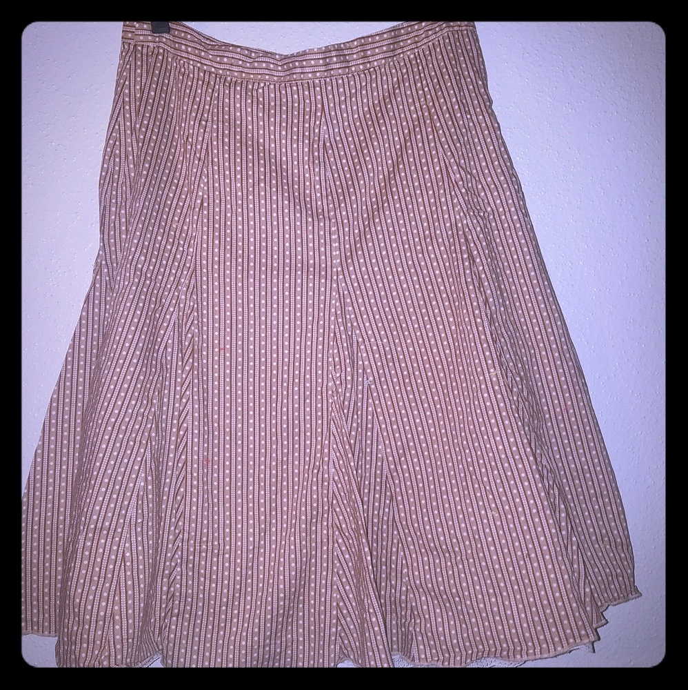 Women's brown, cream, and maroon skirt
